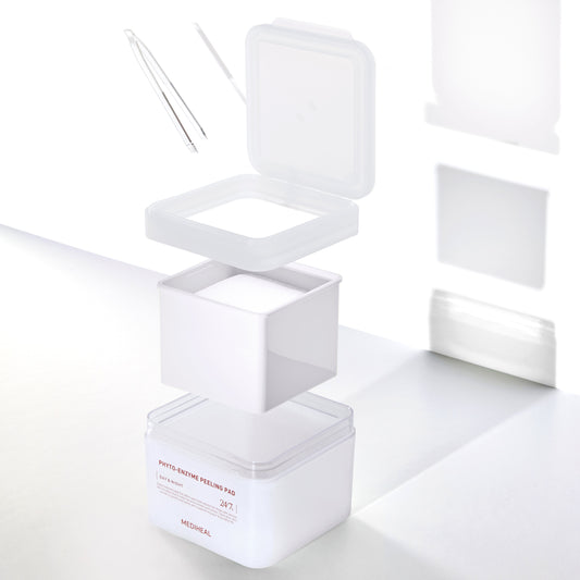 White cosmetic container with lid on a white background